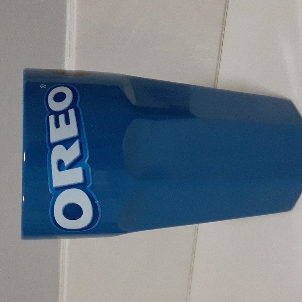 Small Oreo cookie milk cup or mug.